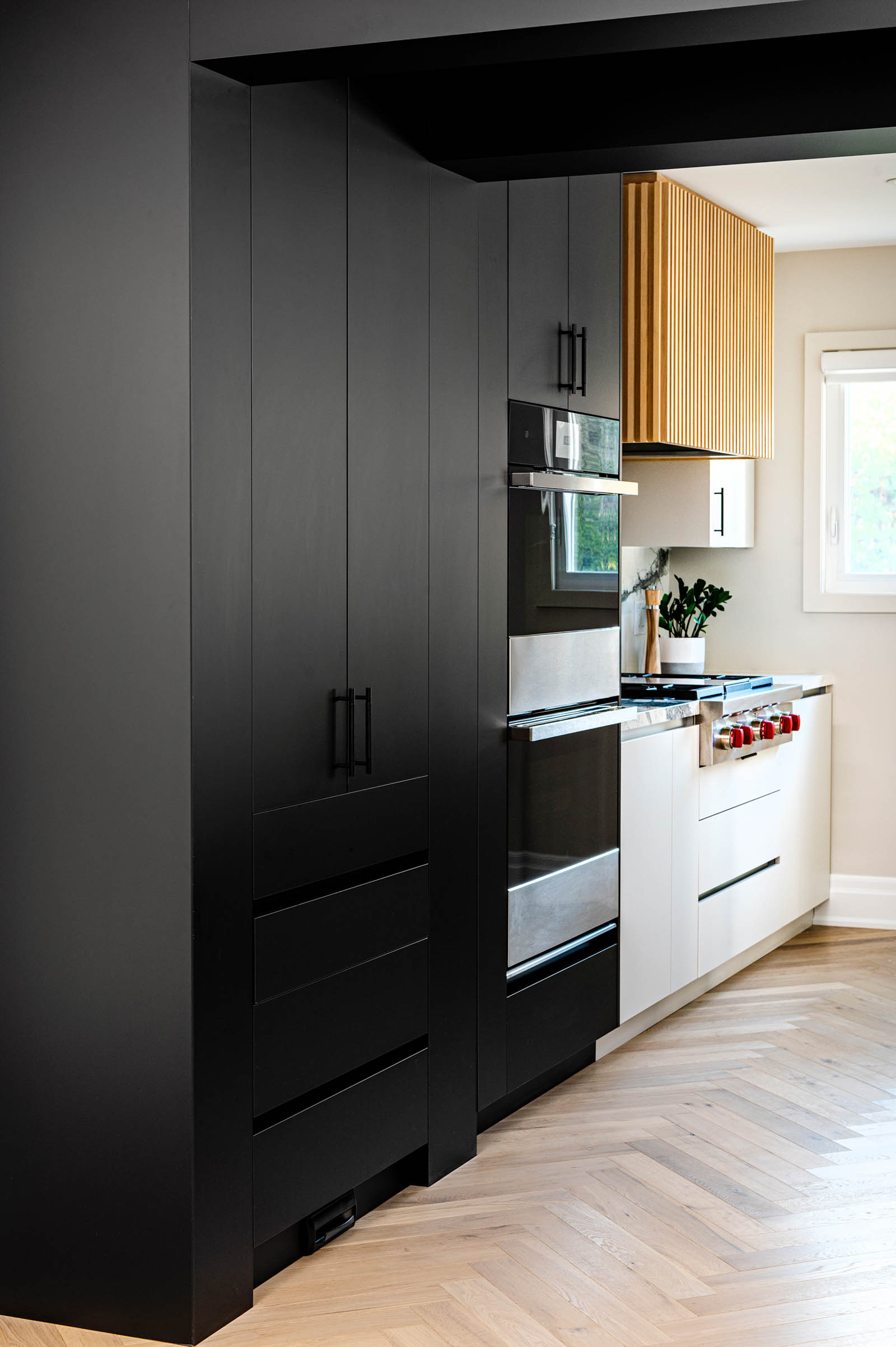 Image of Custom Kitchen Storage Cabinetry, transition from dining room to kitchen.