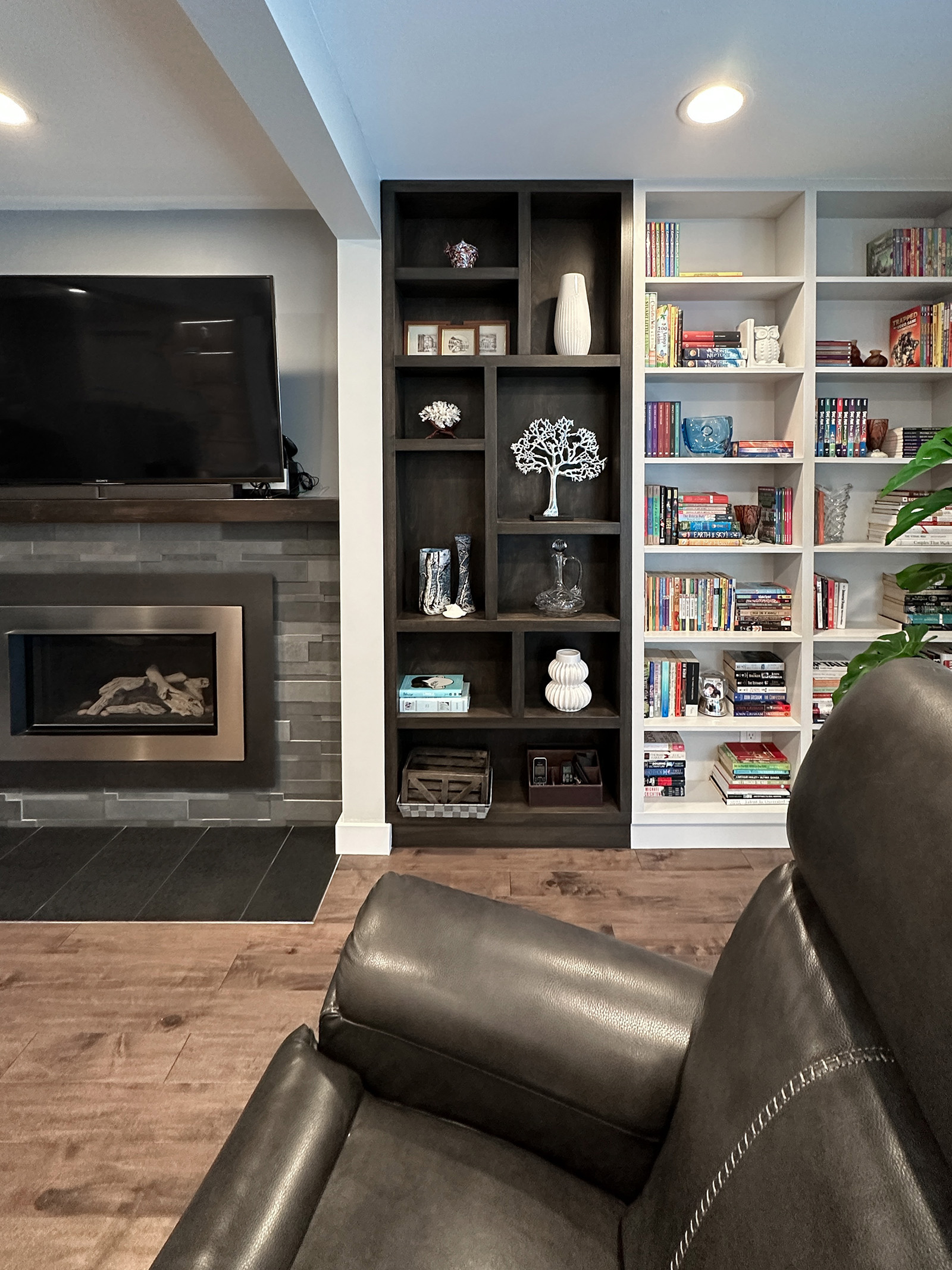 Family room in the Bayview Residence with custom-built bookshelves