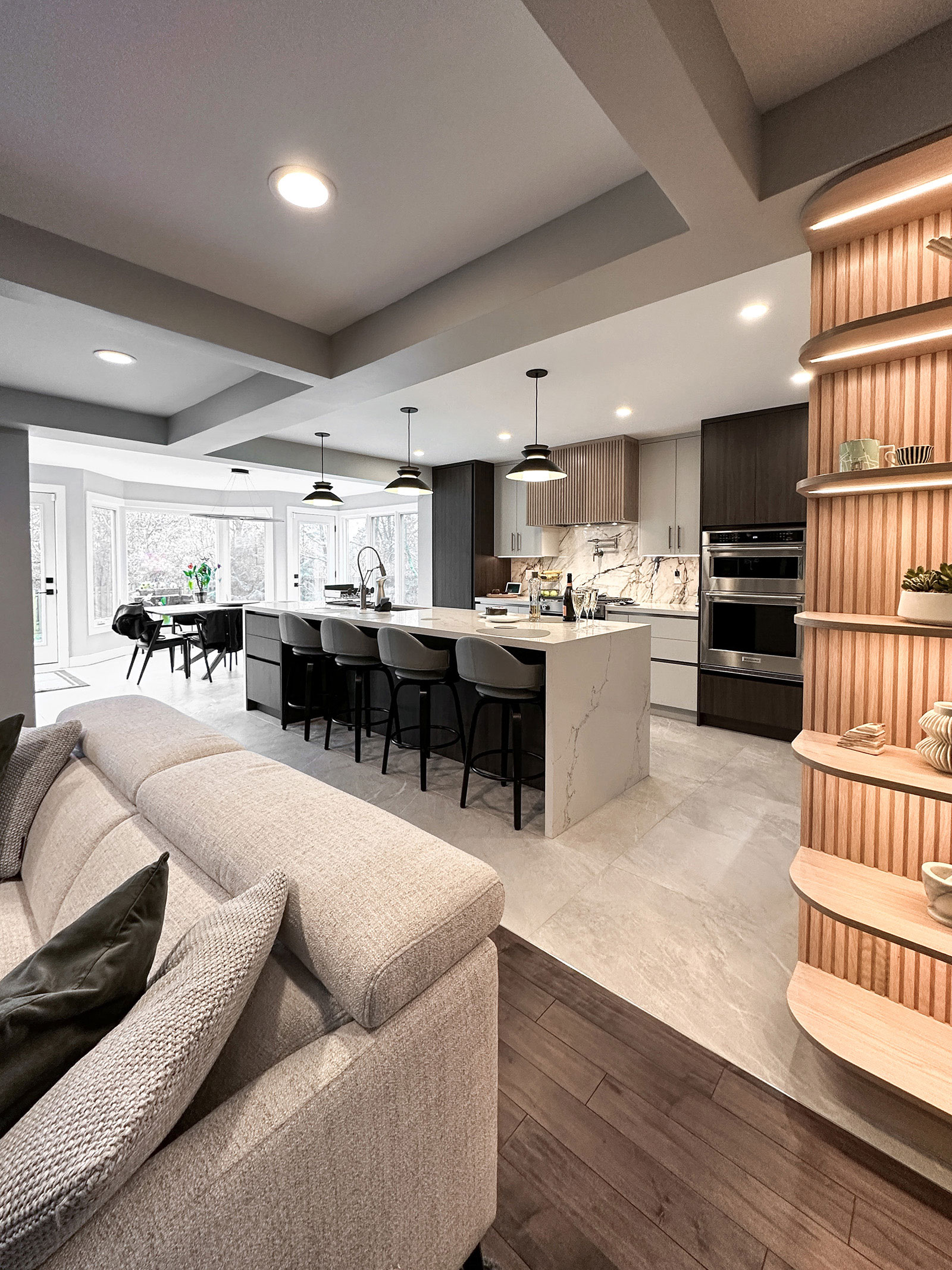 View from family room into new open kitchen at Bayview Residence